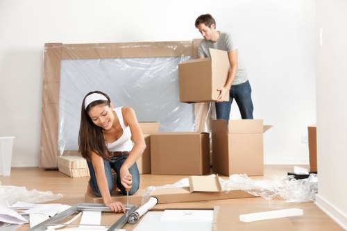 Removal van and moving boxes representing home removals in Uxbridge