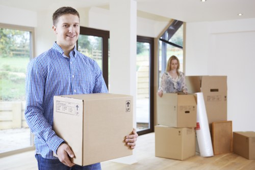 Office relocation planning in Uxbridge with moving boxes and workspace preparation