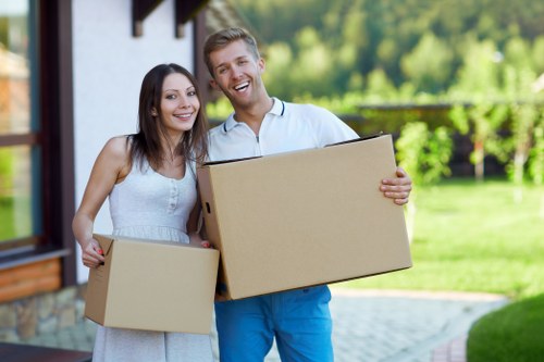 Loading furniture into a van for a Uxbridge home move
