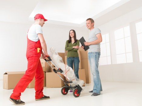 Packed boxes and furniture ready for local removals
